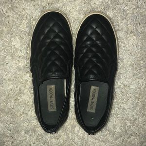 Steve Madden black quilted slip ons